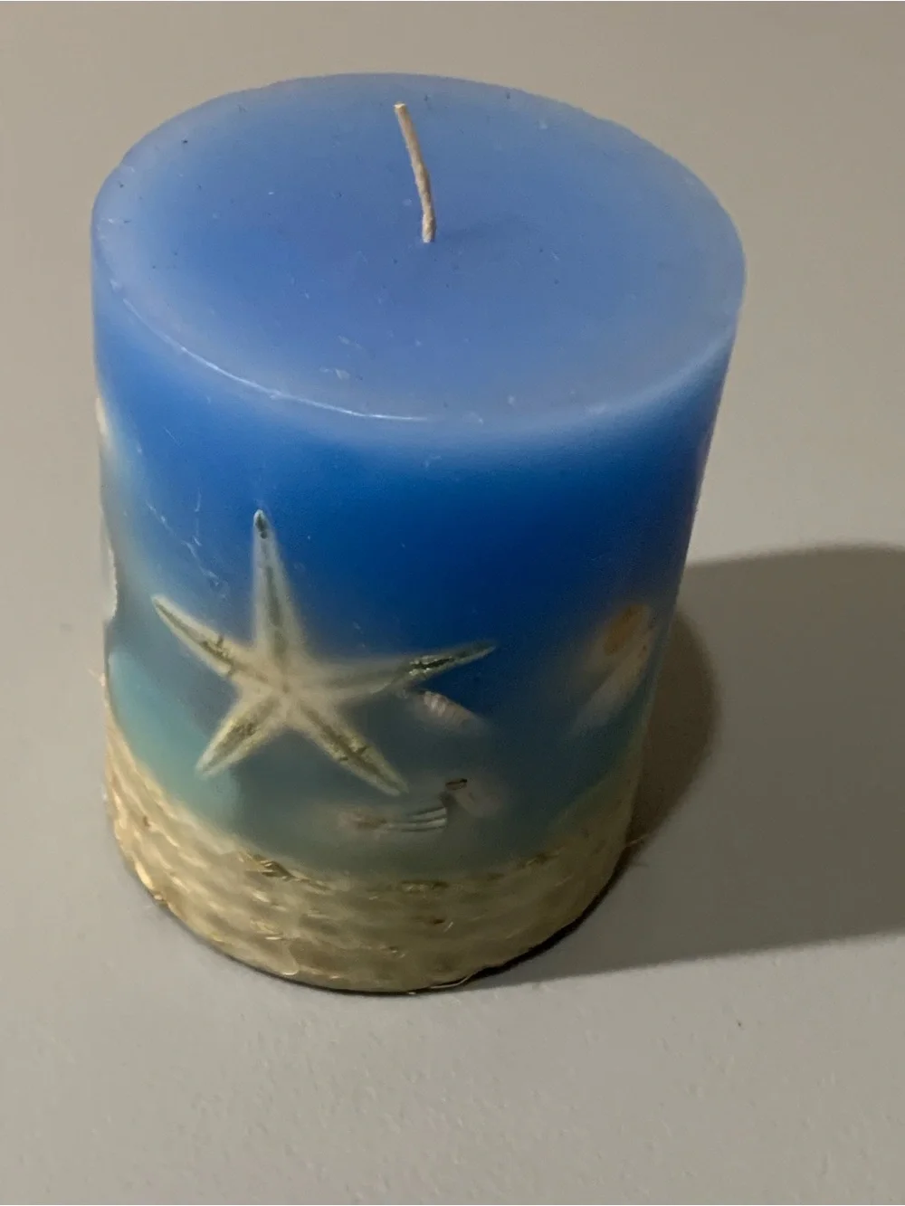 Blue Seashell Pillar Candle with Embedded Shell Accents